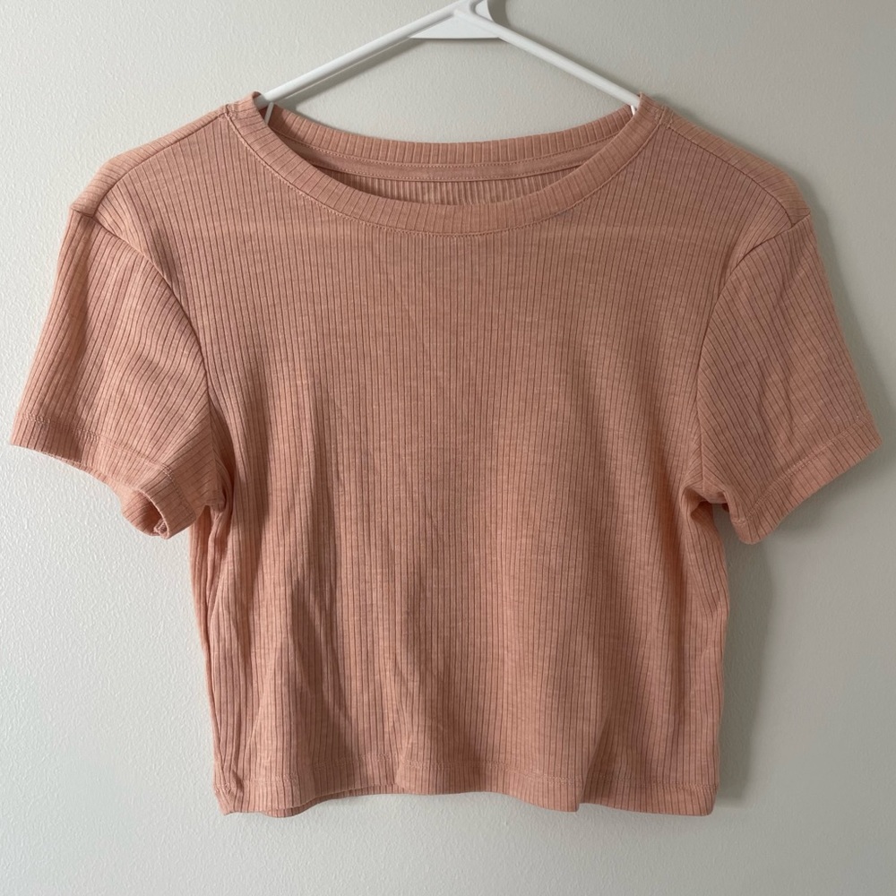 Cropped pink fitted nollie top, size Large
